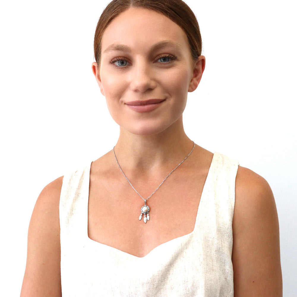 Model wearing Feather Button Cultured Pearl Necklace in Sterling Silver, 2 of 5