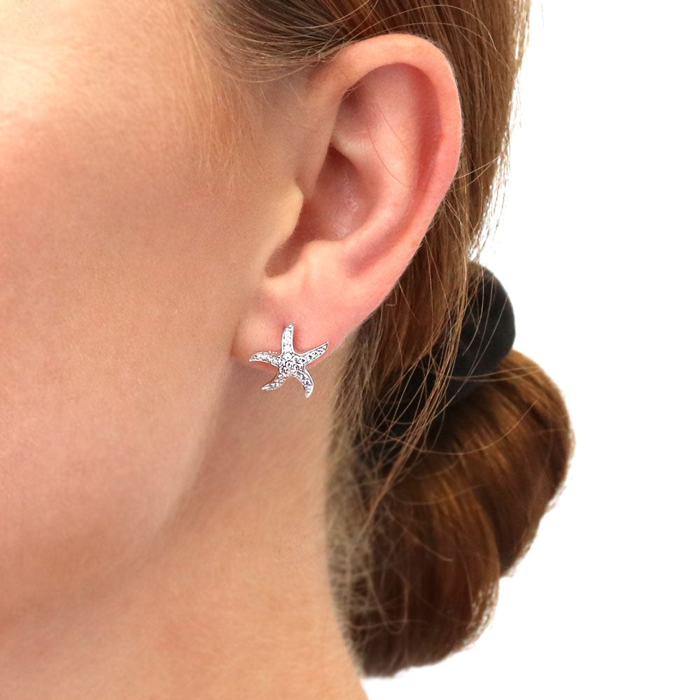 Model wearing Starfish CZ Stud Earrings in Sterling Silver, 5 of 12