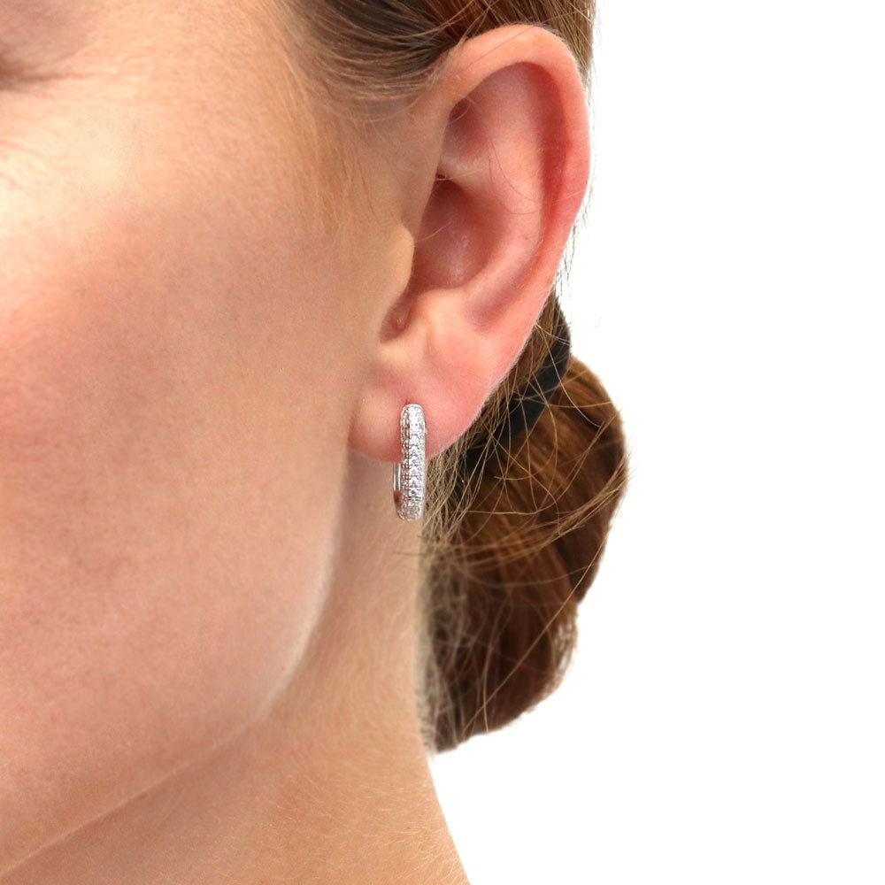Model wearing Rectangle CZ Medium Hoop Earrings in Sterling Silver 0.62 inch, 6 of 12