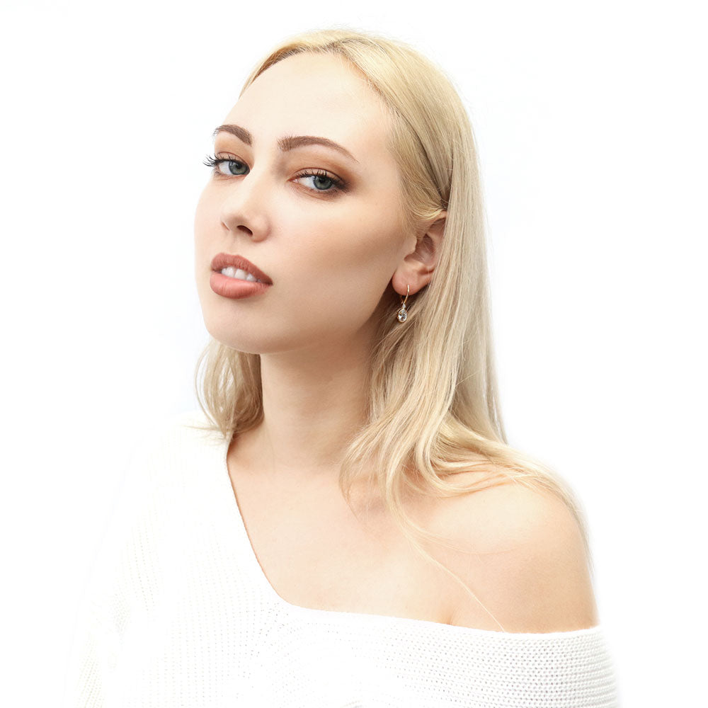 Model wearing CZ Leverback Earrings in Sterling Silver, Yellow Gold Flashed