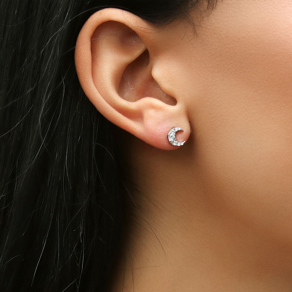 Model wearing Crescent Moon CZ Stud Earrings in Sterling Silver, 5 of 10
