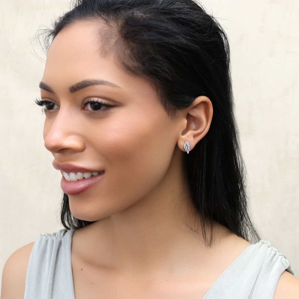 Model wearing Leaf CZ Stud Earrings in Sterling Silver, 3 of 6