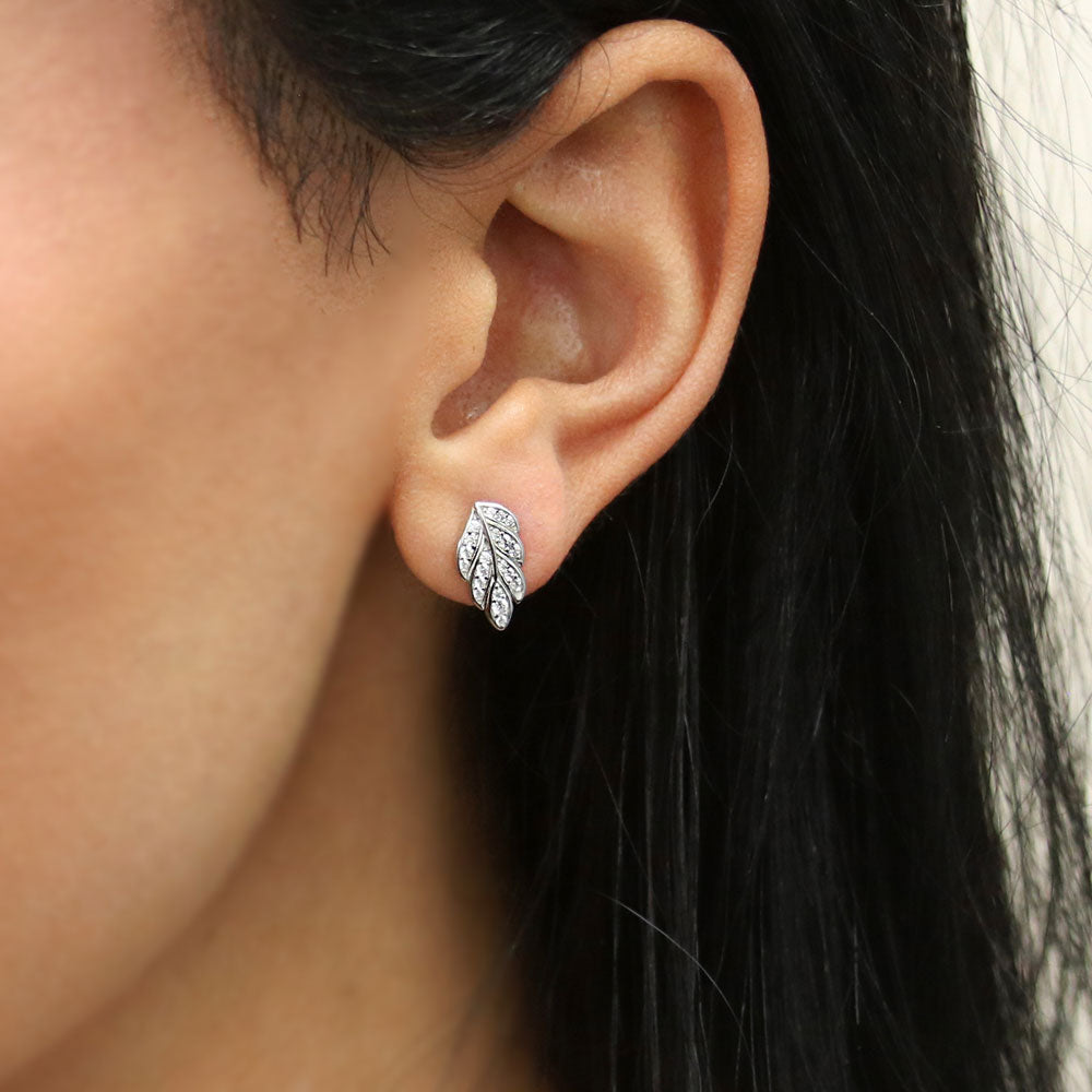 Model wearing Leaf CZ Stud Earrings in Sterling Silver, 2 of 6