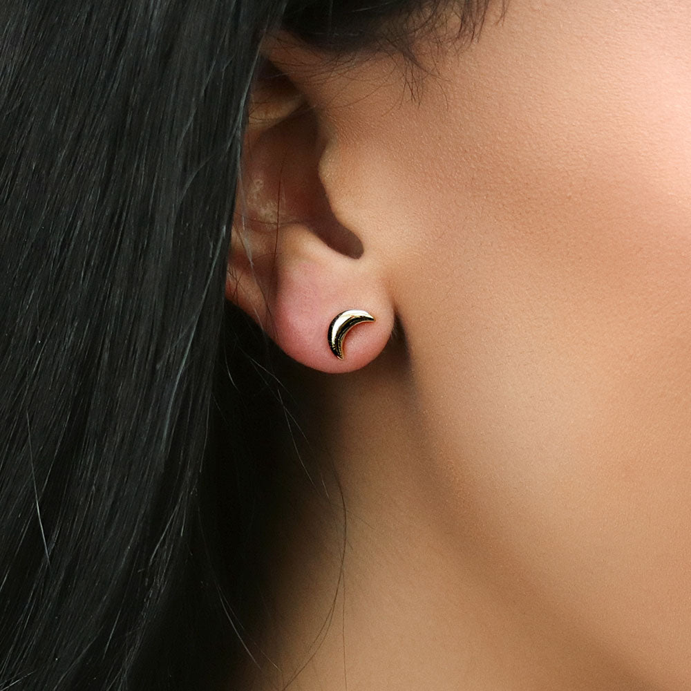 Model wearing Crescent Moon Stud Earrings in Sterling Silver, 6 of 11