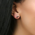Model wearing Crescent Moon Cartilage Stud Earrings in Sterling Silver, Yellow Gold Flashed