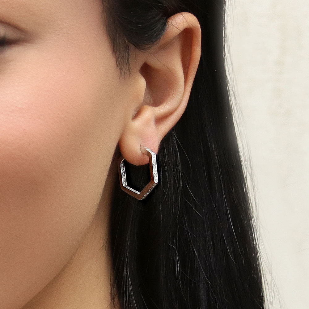 Model wearing Hexagon CZ Small Inside-Out Hoop Earrings in Sterling Silver 0.8 inch, Rhodium Plated
