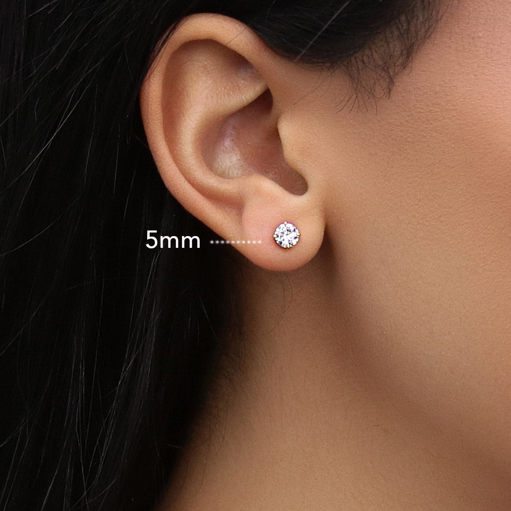 Model wearing Solitaire Round CZ Stud Earrings in Gold Flashed Sterling Silver, 4 of 14