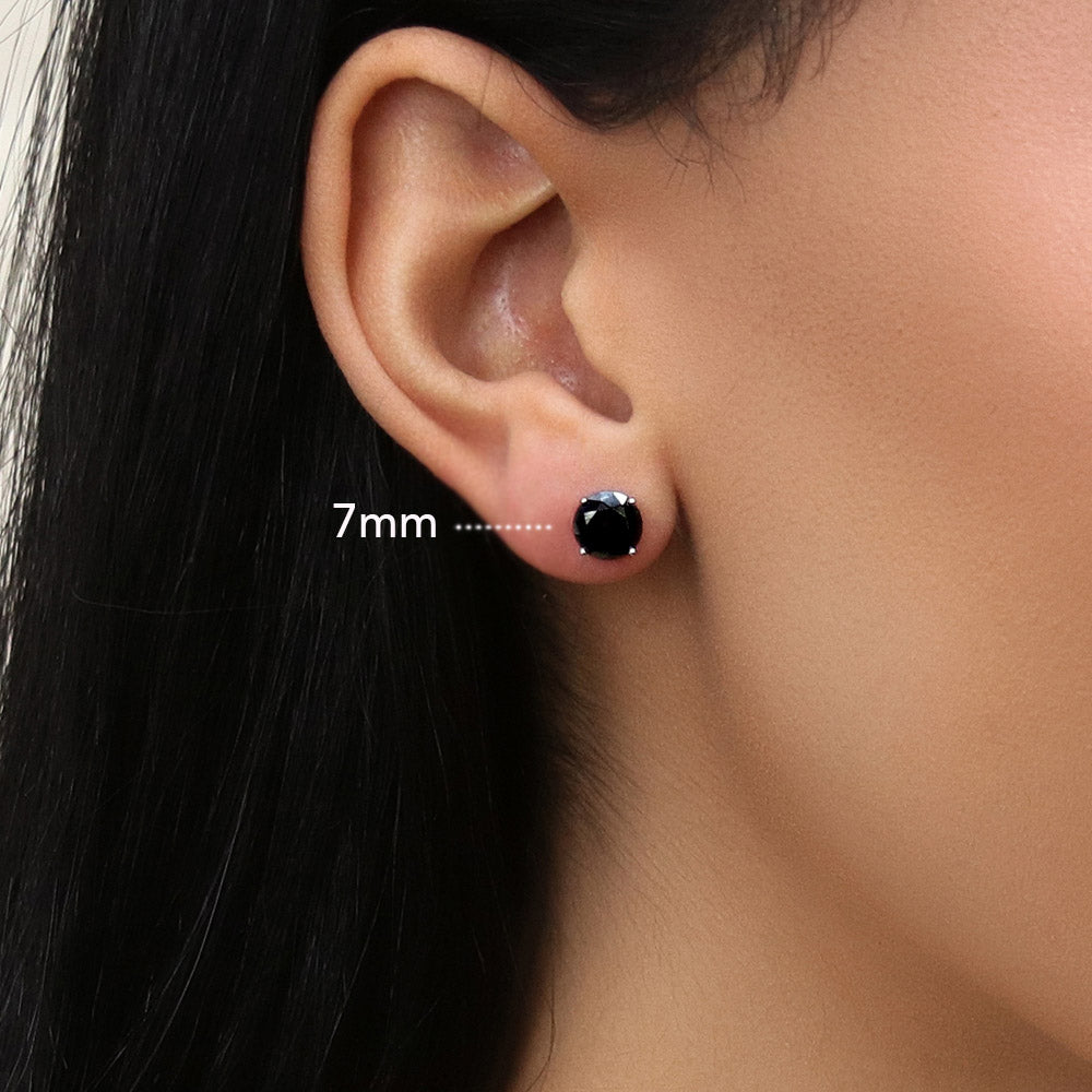 Model wearing Solitaire Black Round CZ Stud Earrings in Sterling Silver, 6 of 9