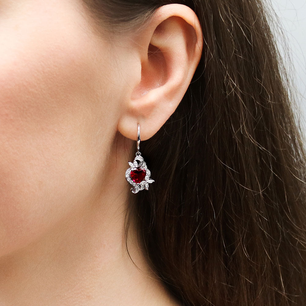 Model wearing Heart Flower CZ Fish Hook Earrings in Sterling Silver, Ruby Color