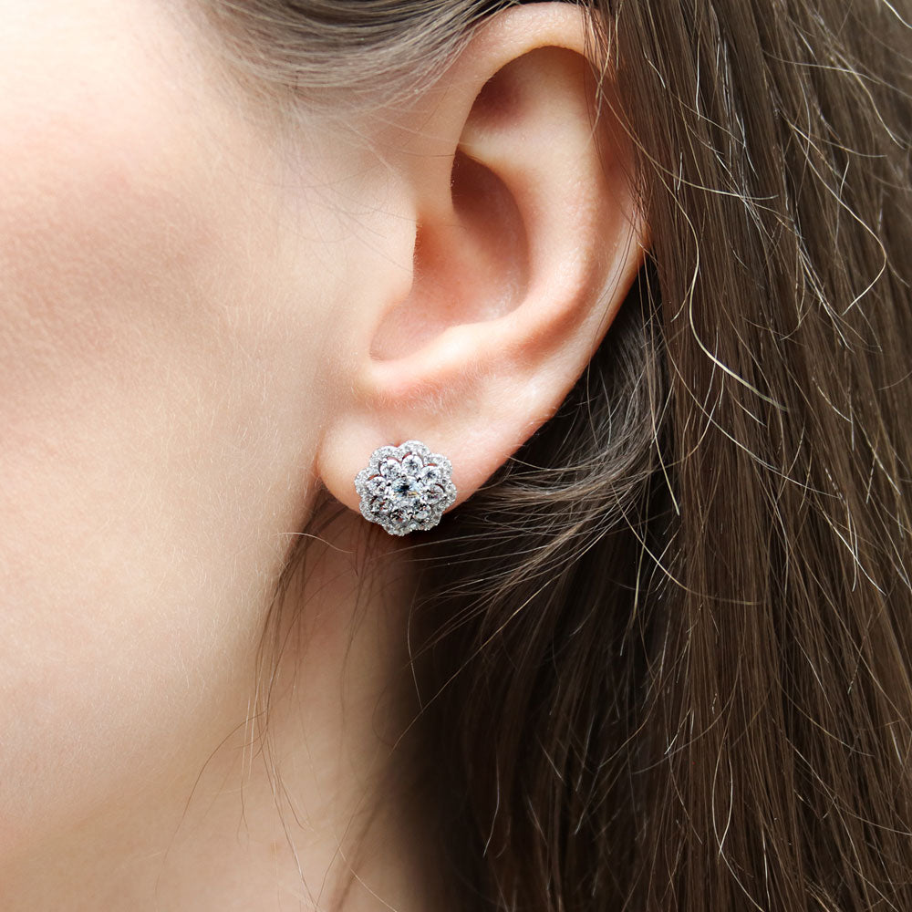 Model wearing Flower Halo CZ Stud Earrings in Sterling Silver, 2 of 8
