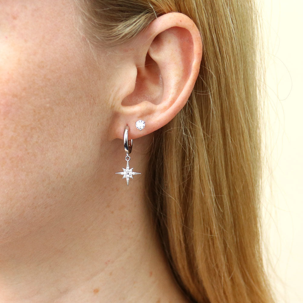 Model wearing Halo Solitaire Round CZ Stud Earrings in Sterling Silver, 2 Pairs, 15 of 19