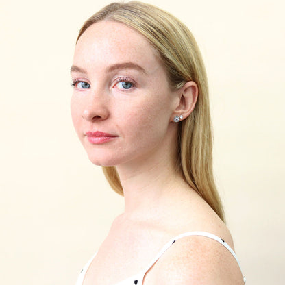 Model Wearing Halo Stud Earrings Style E1561-01, Solitaire Stud Earrings Style E1809-01