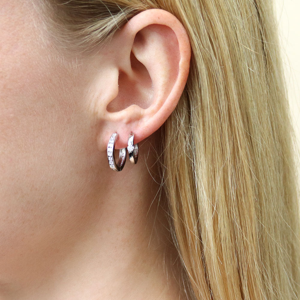 Model wearing Solitaire Round CZ Hoop Earrings in Sterling Silver 0.12ct, 2 Pairs, 5 of 12