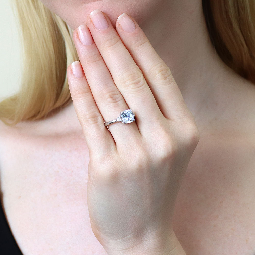 Model wearing 3-Stone 3ct Cushion CZ Ring in Sterling Silver, 2 of 9