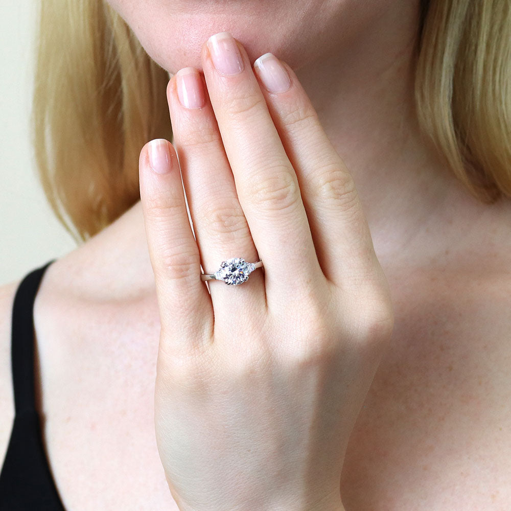 Model wearing 3-Stone Round CZ Ring in Sterling Silver, 2 of 10