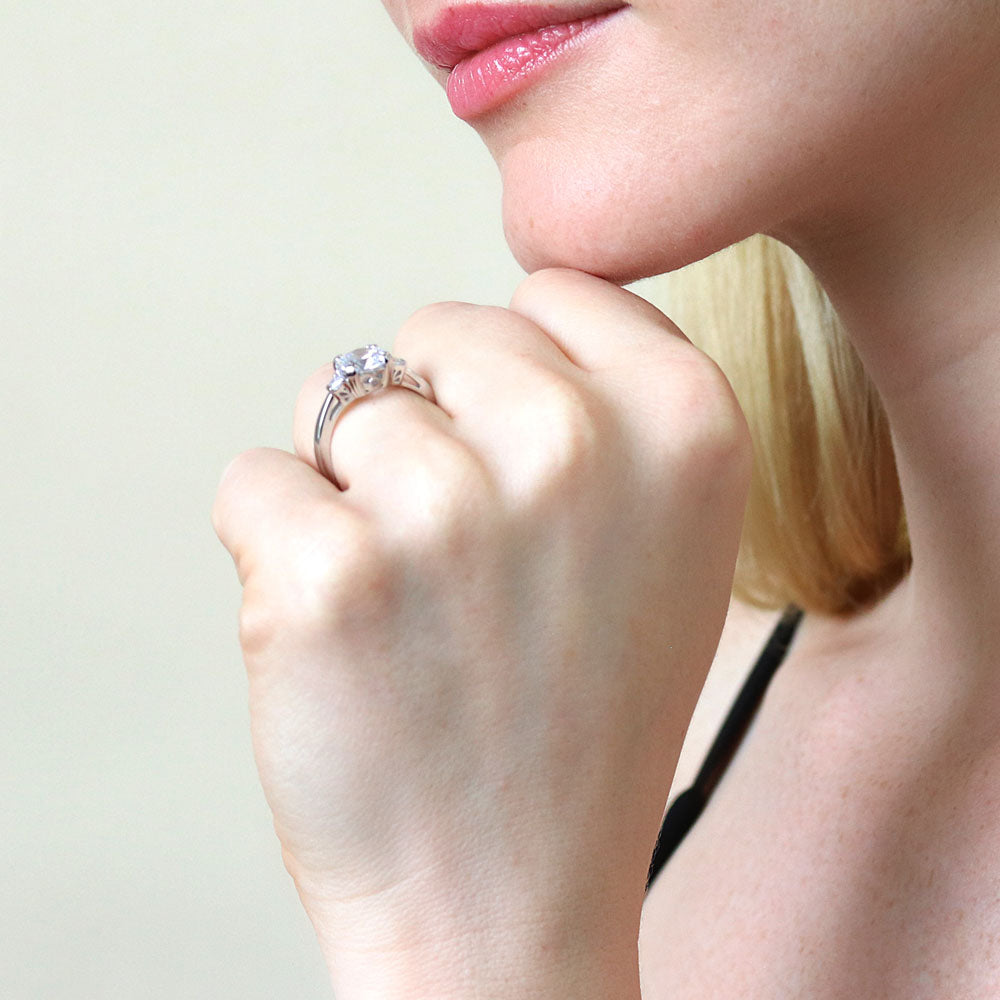 Model wearing 3-Stone Round CZ Ring in Sterling Silver, 3 of 10