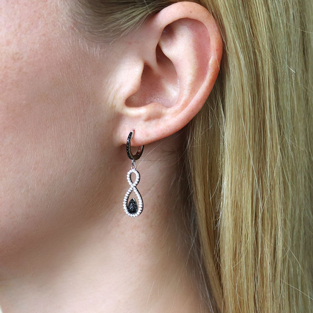 Model wearing Black and White Infinity Black CZ Earrings in Sterling Silver, 2 of 9