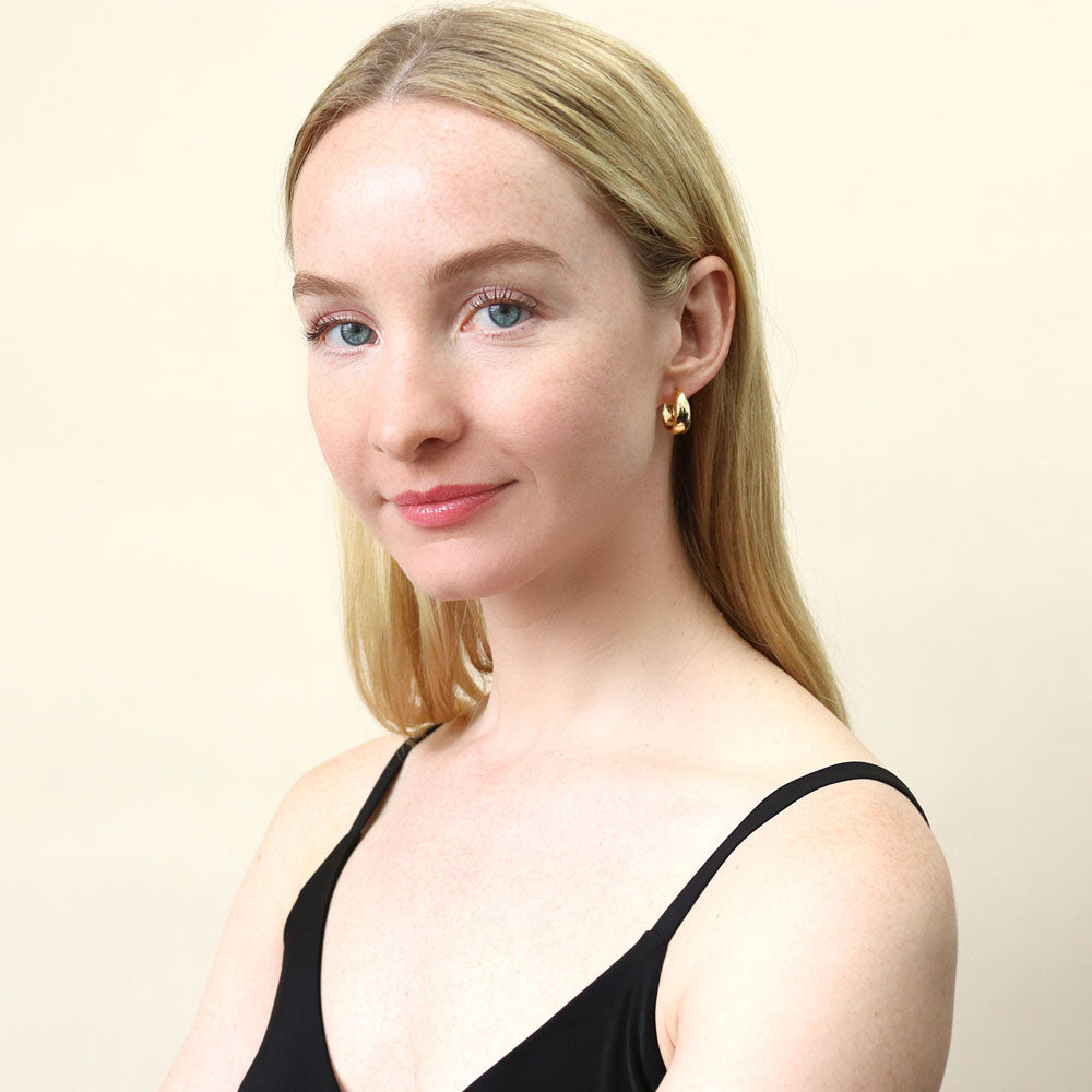 Model wearing Dome Small Hoop Earrings in Sterling Silver 0.8-1 inch, 2 Pairs, Yellow Gold Flashed