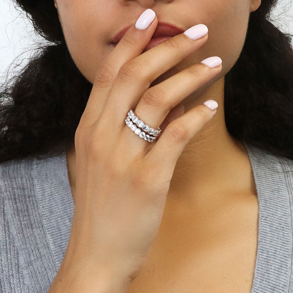 Model wearing East-West Milgrain Bezel Oval CZ Eternity Ring in Sterling Silver, 8 of 10