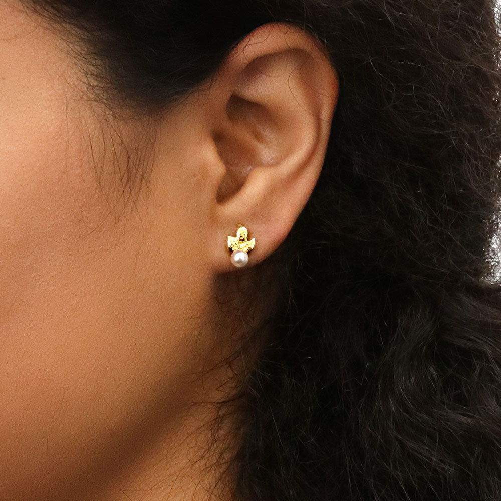 Model wearing Leaf Imitation Pearl Stud Earrings in Sterling Silver, Yellow Gold Flashed