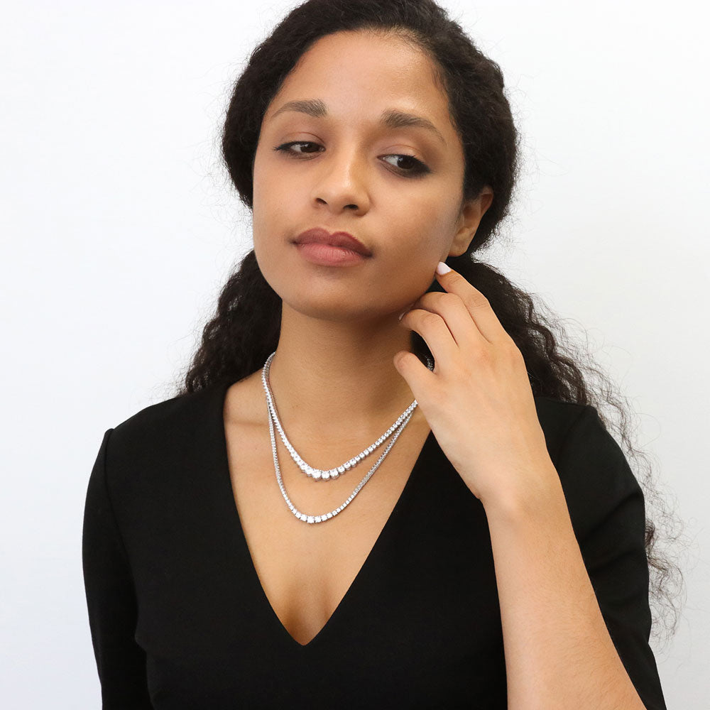 Model wearing Graduated CZ Tennis Necklace and Earrings Set in Sterling Silver, 13 of 17