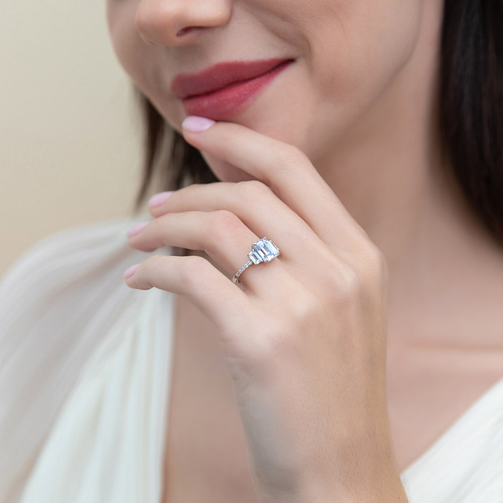 Model wearing 3-Stone 2.1ct Emerald Cut CZ Ring in Sterling Silver, 9 of 10