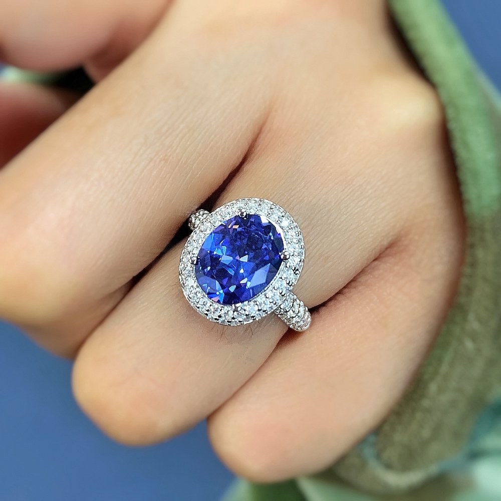 Model wearing Halo Blue Oval CZ Ring in Sterling Silver, 3 of 7