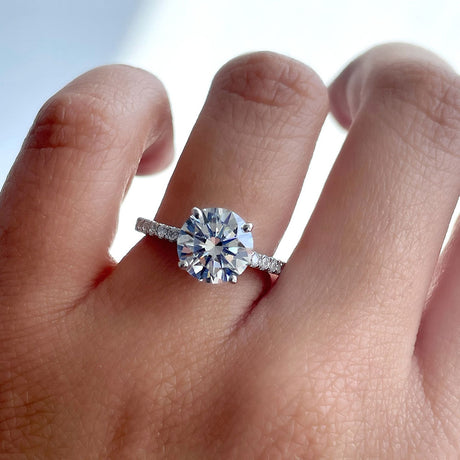Image Contain: Model Wearing Solitaire with Side Stones Ring