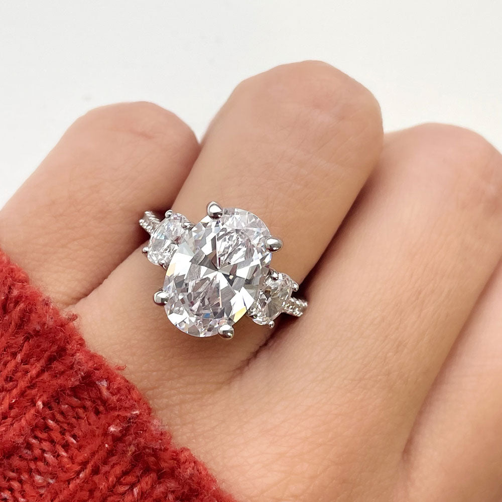 Model wearing 3-Stone 5.5ct Oval CZ Ring in Sterling Silver, 3 of 12