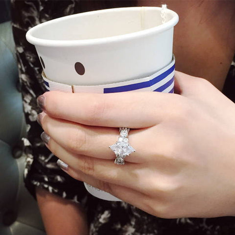 Model Wearing 3-Stone Ring Style R1593-01, Wishbone Curved Half Eternity Ring Style R1451-B