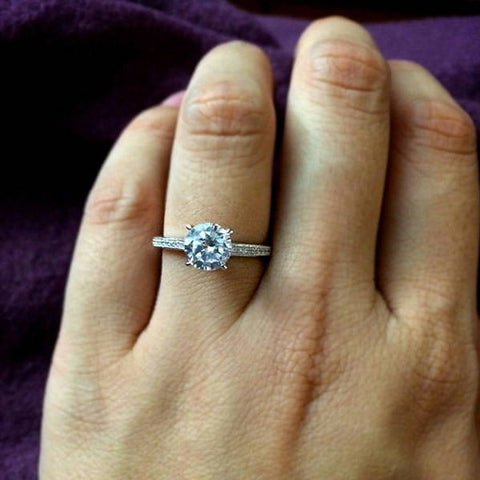 Model Wearing 3-Stone Ring Style R1593-01, Wishbone Curved Half Eternity Ring Style R1451-B