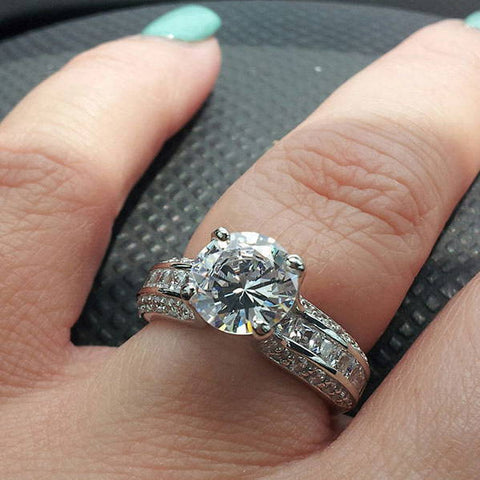Model Wearing 3-Stone Ring Style R1593-01, Wishbone Curved Half Eternity Ring Style R1451-B