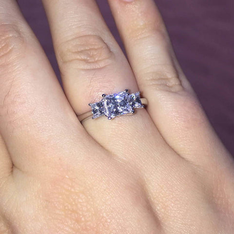 Model Wearing 3-Stone Ring Style R1593-01, Wishbone Curved Half Eternity Ring Style R1451-B