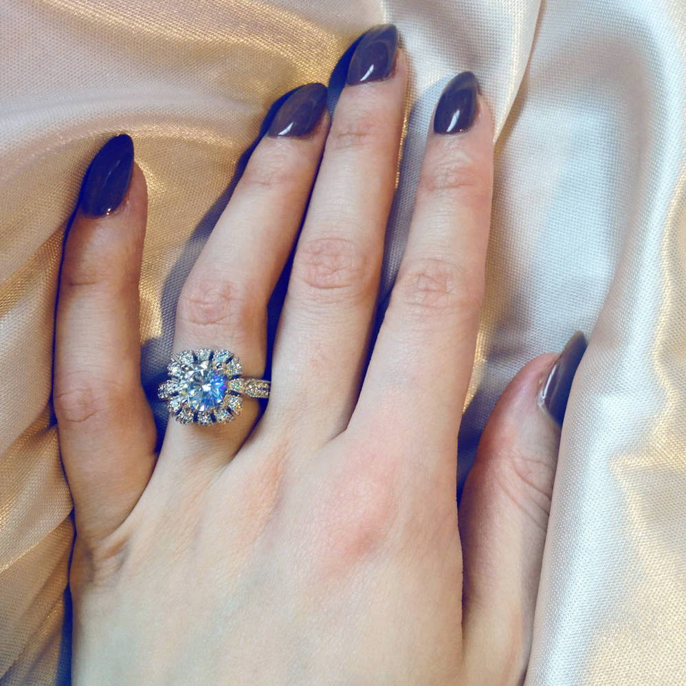 Model Wearing 3-Stone Ring Style R1593-01, Wishbone Curved Half Eternity Ring Style R1451-B