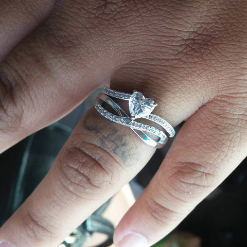 Image Contain: Model Wearing Infinity Ring, Solitaire with Side Stones Ring