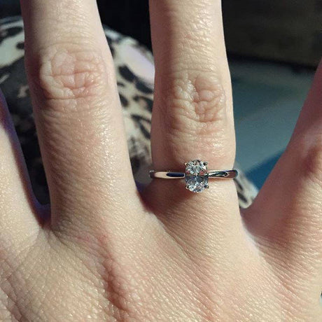 Image Contain: Model Wearing Solitaire Ring