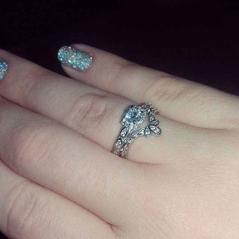 Image Contain: Model Wearing Flower Ring, Solitaire with Side Stones Ring