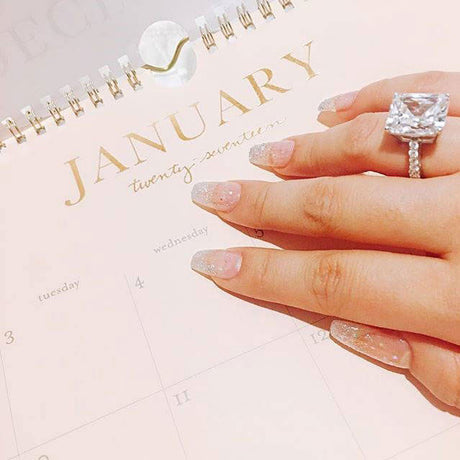 Image Contain: Model Wearing Solitaire with Side Stones Ring