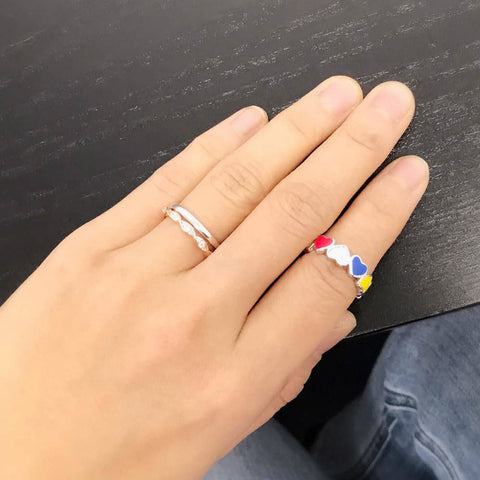 Image Contain: Model Wearing Band, Heart Enamel Ring, Woven Eternity Ring