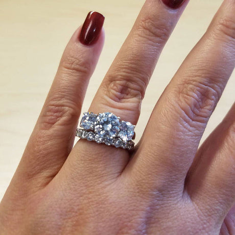 Image Contain: Model Wearing 3-Stone Ring, Eternity Ring