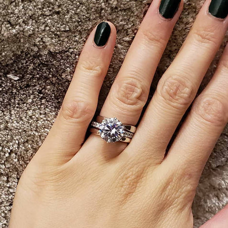 Image Contain: Model Wearing Band, Solitaire with Side Stones Ring