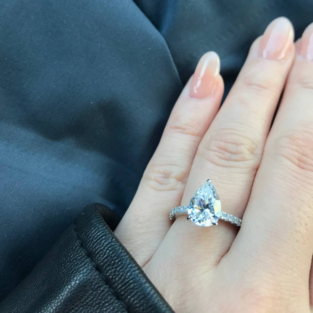 Image Contain: Model Wearing Solitaire with Side Stones Ring