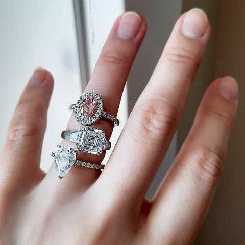 Image Contain: Model Wearing 3-Stone Ring, Halo Ring, Solitaire with Side Stones Ring