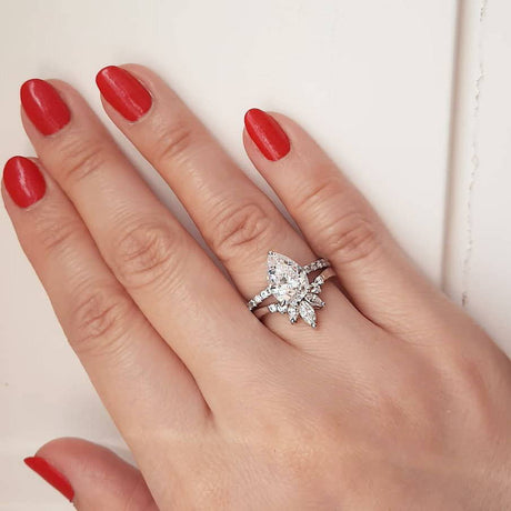 Image Contain: Model Wearing Flower Curved Band, Solitaire with Side Stones Ring