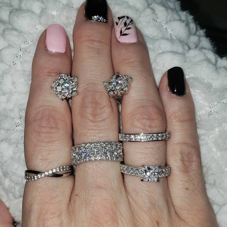 Model Wearing Half Eternity Ring, Infinity Ring, Solitaire with Side Stones Ring, Stud Earrings