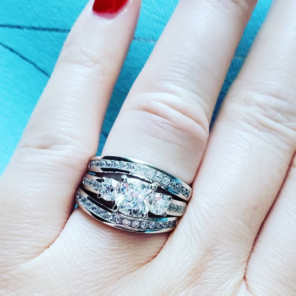 Image Contain: Model Wearing 3-Stone Ring, Curved Half Eternity Ring