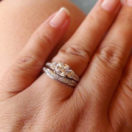 Model Wearing 3-Stone Ring, Curved Half Eternity Ring