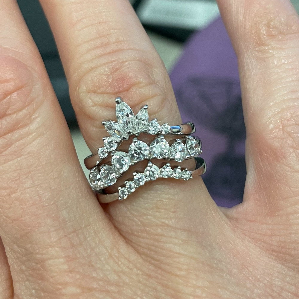 Image Contain: Model Wearing Curved Half Eternity Ring, Flower Curved Band, Wishbone Curved Band