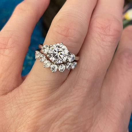 Model Wearing 3-Stone Ring, Curved Half Eternity Ring