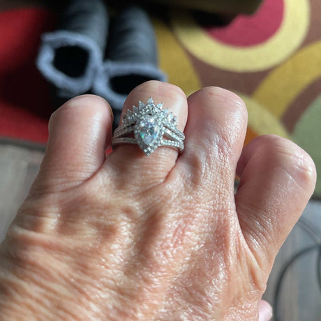 Model Wearing Split Shank Ring, Wishbone Curved Half Eternity Ring